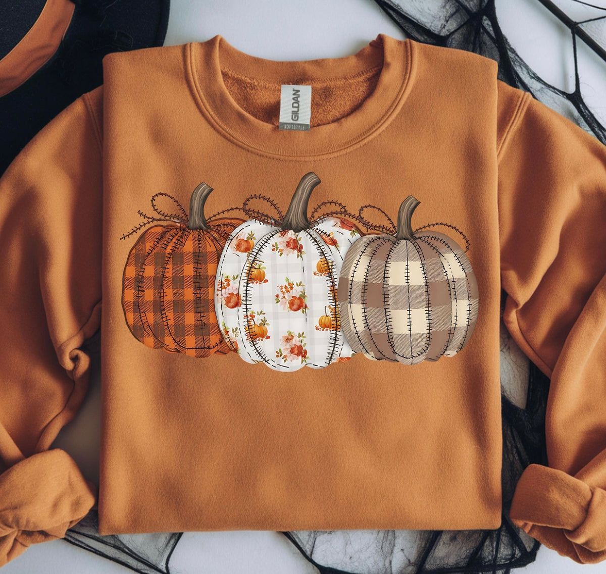 3 fall pumpkins